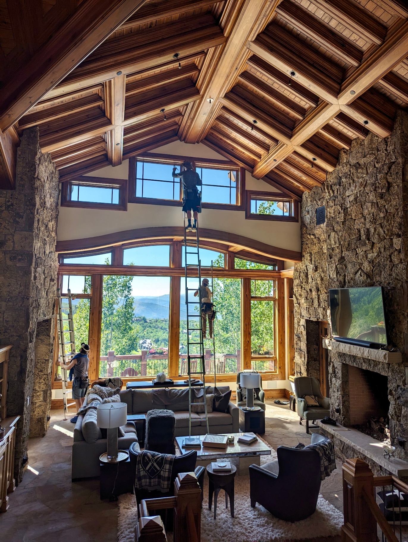 Residential window cleaning on the soaring windows of a mountain home in Vail, Colorado